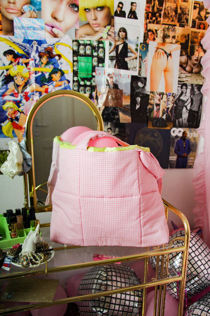 the sweetest pink puffer bag ever