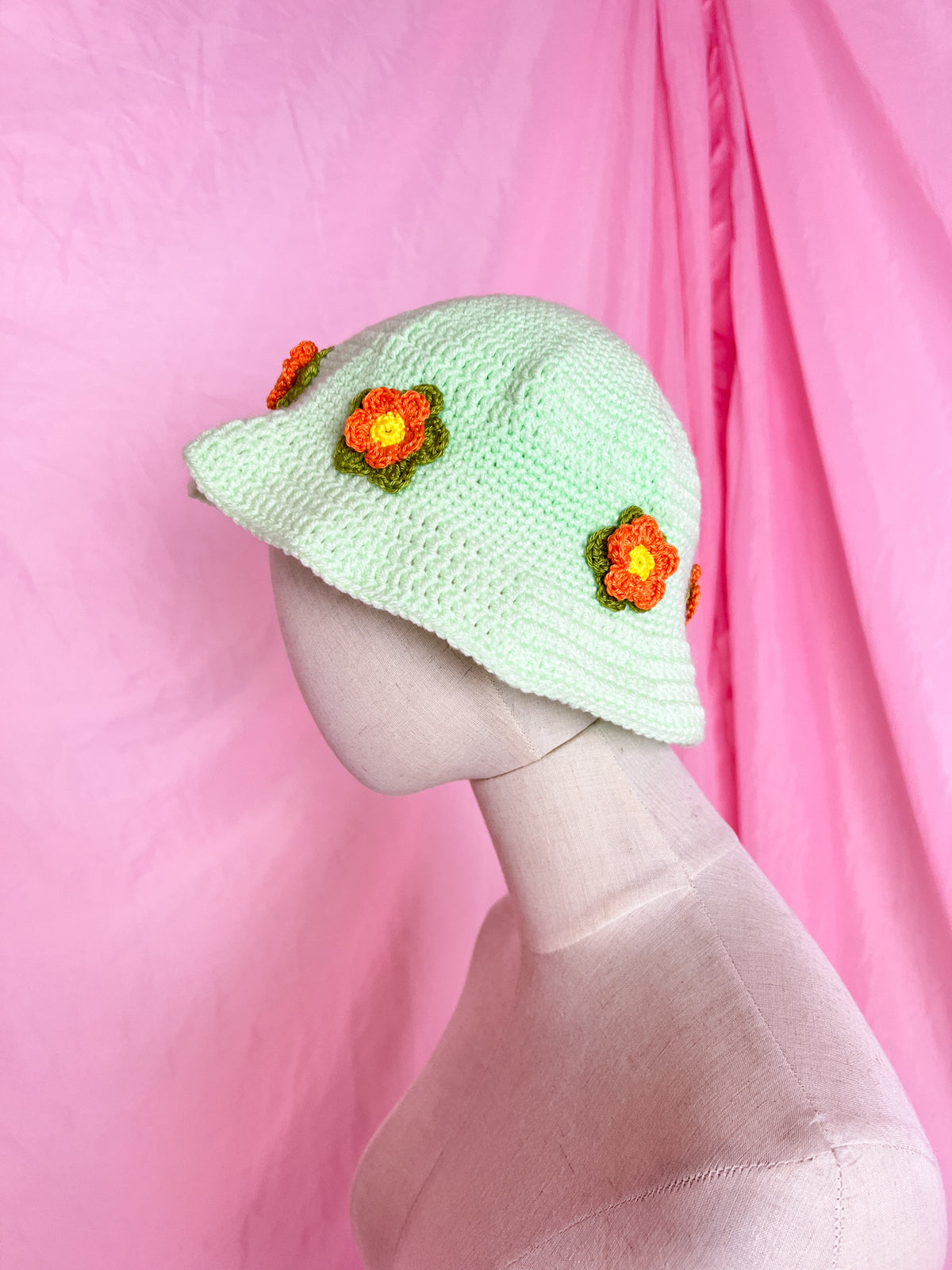 green flower power bucket hat