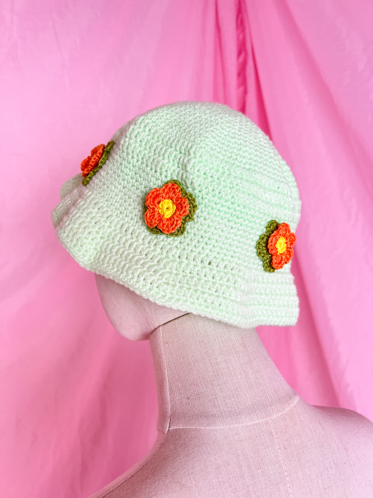 green flower power bucket hat