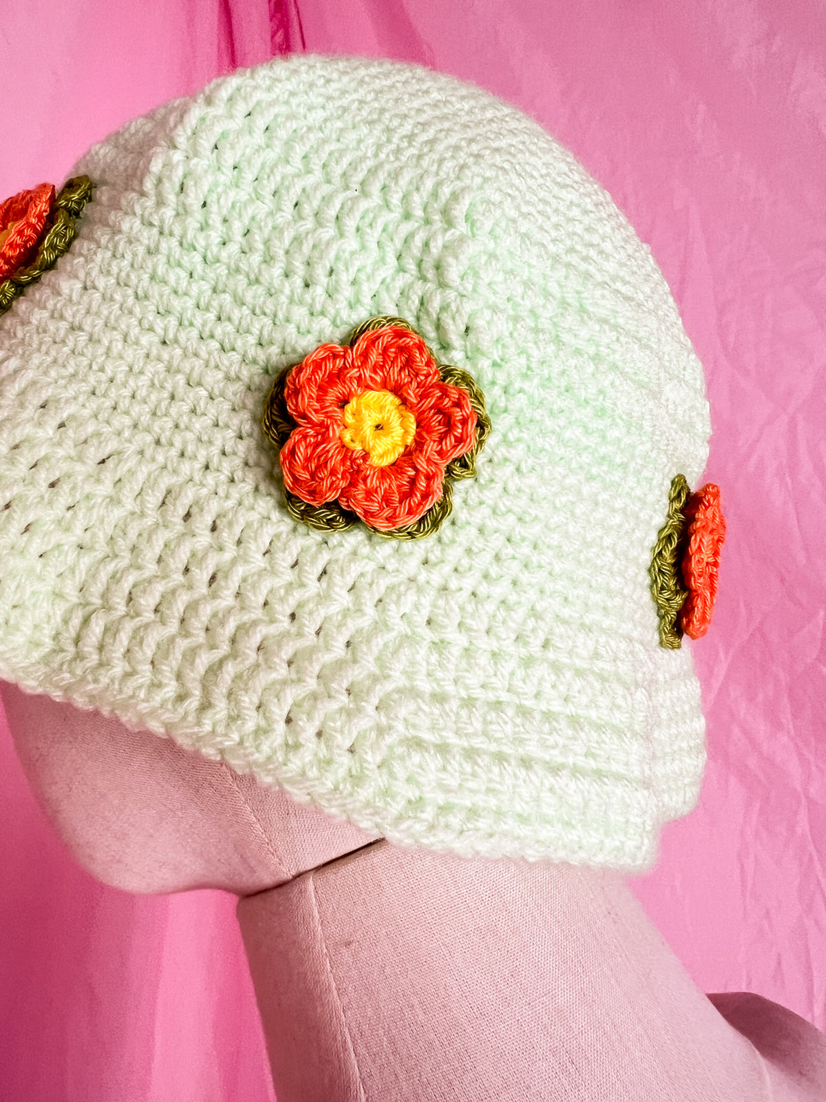green flower power bucket hat
