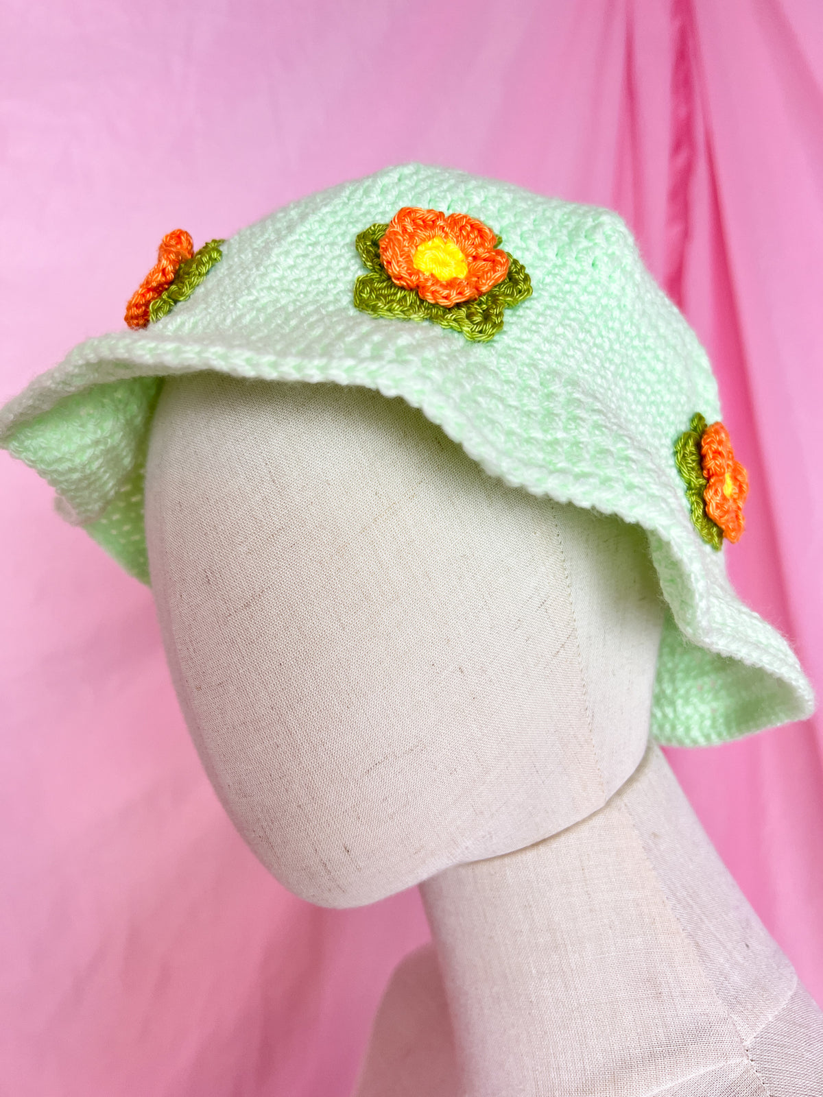 green flower power bucket hat