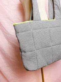 the sweetest grey puffer bag ever