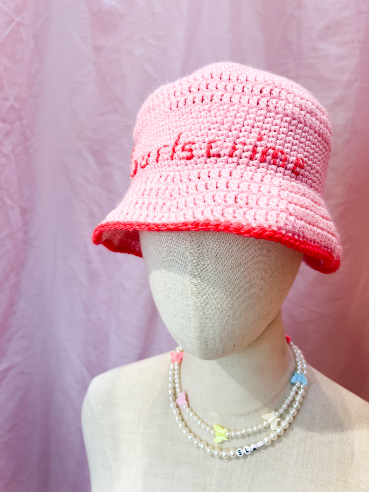 pink/red Gurlscrime bucket hat