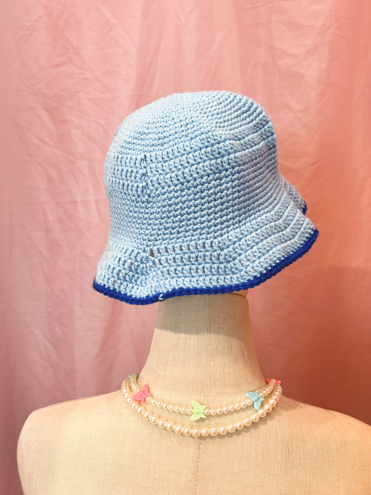 blue Gurlscrime bucket hat