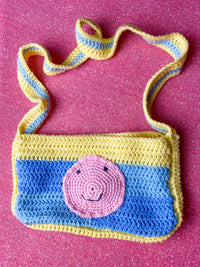 blue and yellow crochet bag