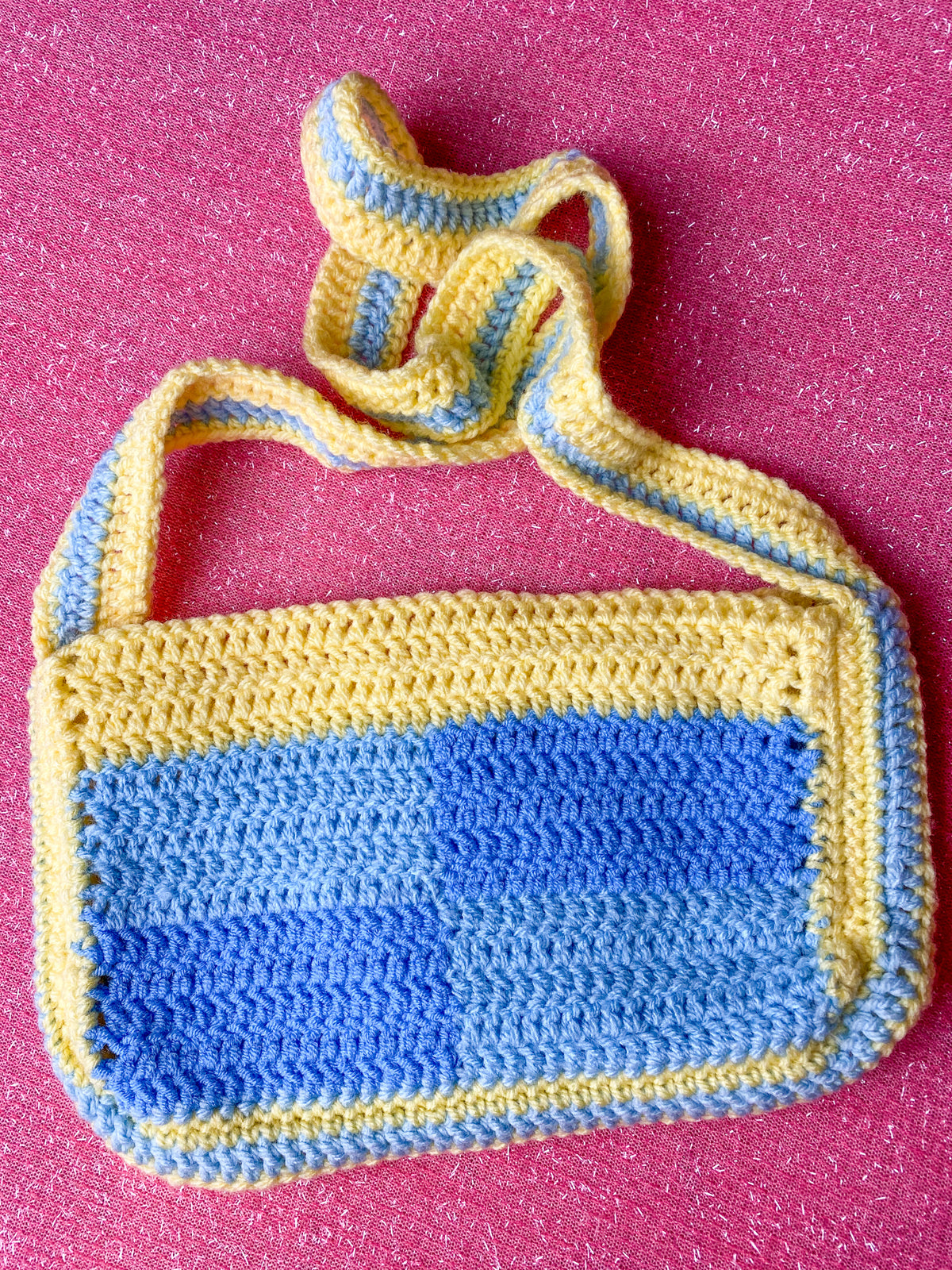 blue and yellow crochet bag